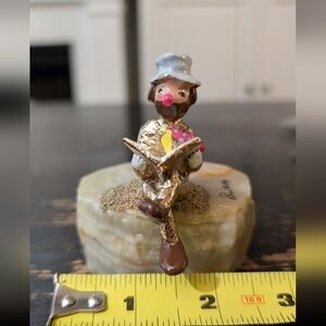 Gold and Brown Clown Figurine